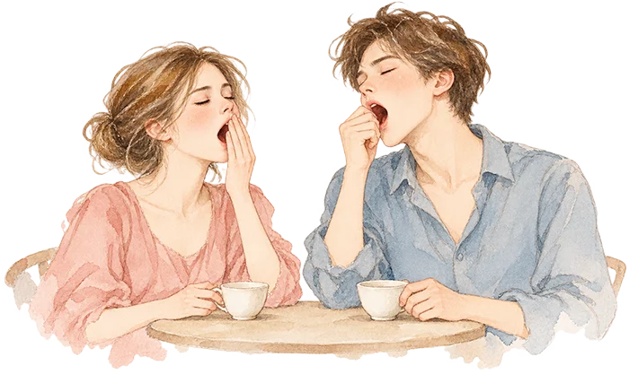 Девушка и парень зевают за чашкой чая